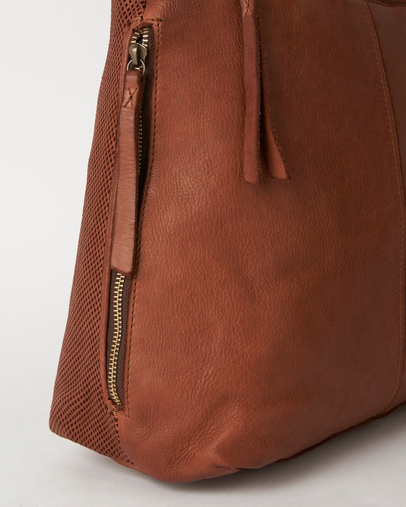 juju & co perforated slouchy bag in cognac