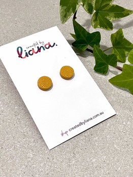 care earrings by liana yellow