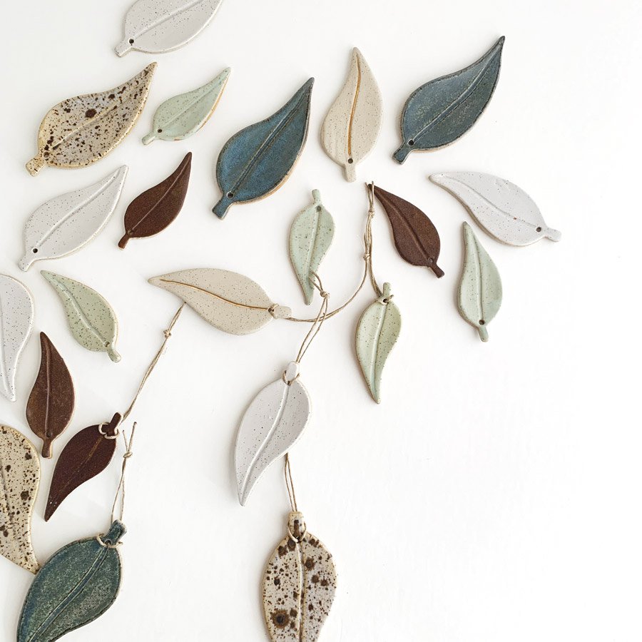 kim wallace ceramics eucalyptus leaf ornament on wall