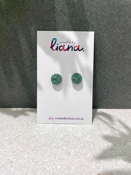 care earrings by liana green