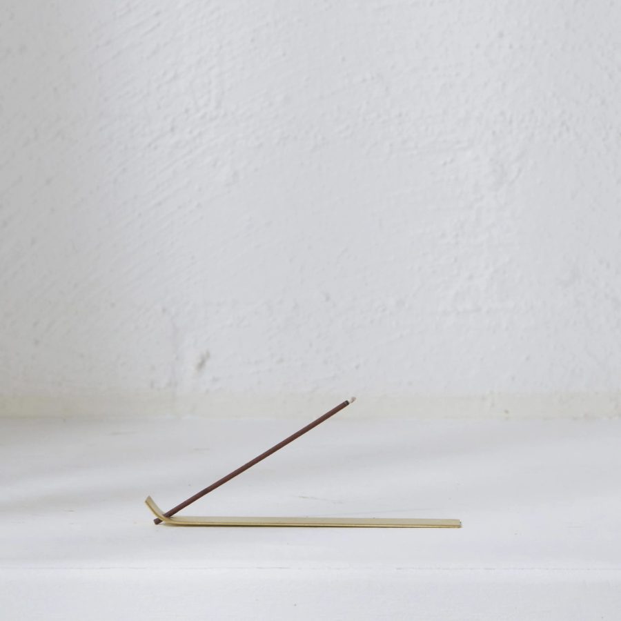 gold incense holder by Kirsty leif this is incense
